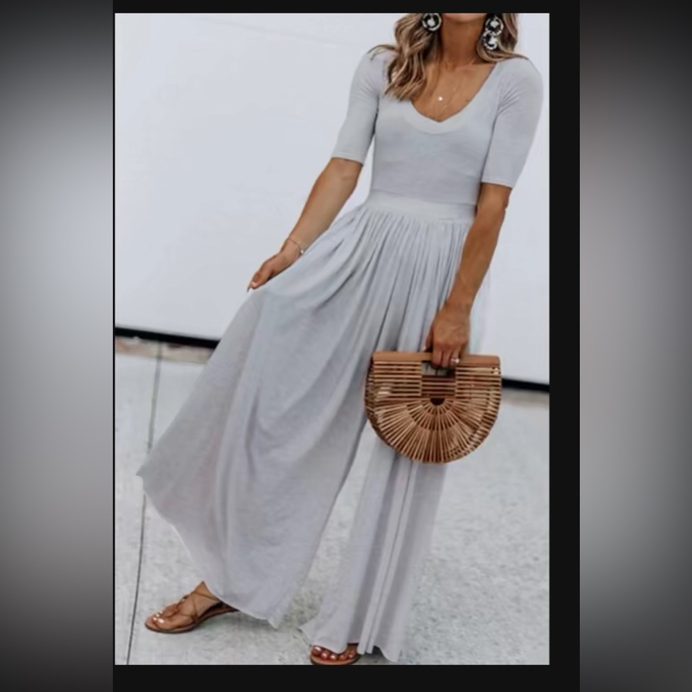 Gray jumpsuit. Brand new. Size M
